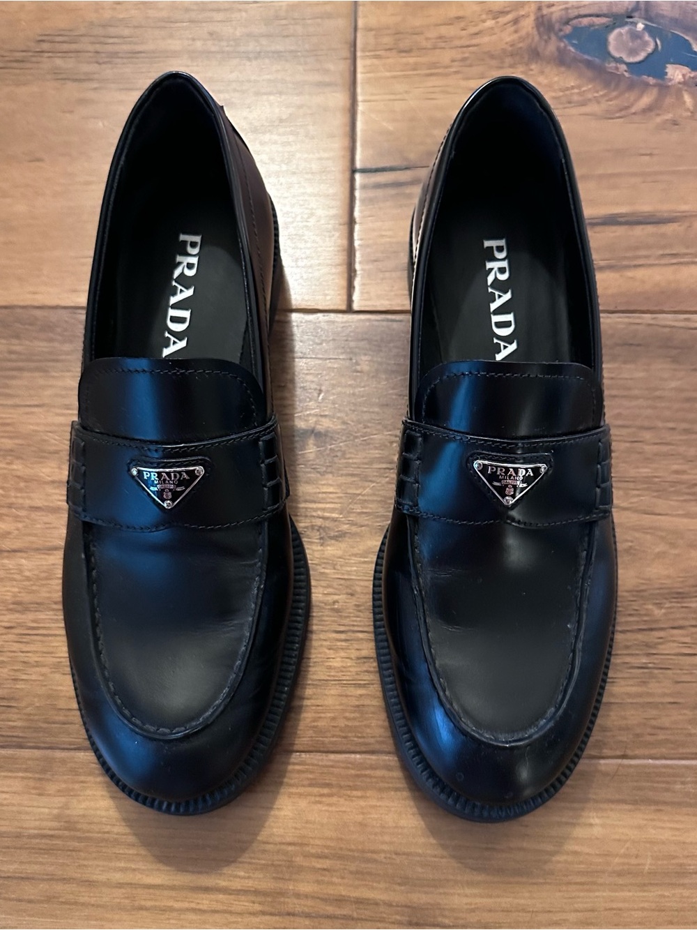 Prada Women’s Black Leather Logo Penny Loafers